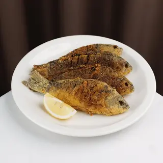 Карасі смажені в кукурудзяному борошні (300г)