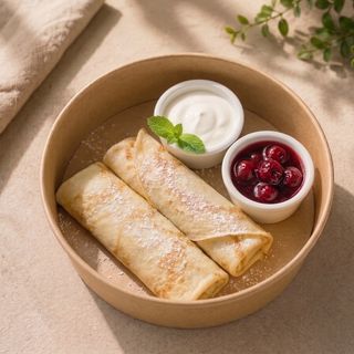 Млинці з вишневим джемом