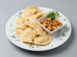 Вареники з картоплею зі шварками (250г/30г)