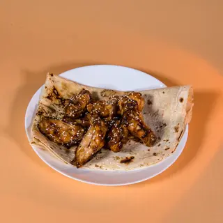 Крильця на мангалі у медово-гранатовому соусі (400г)