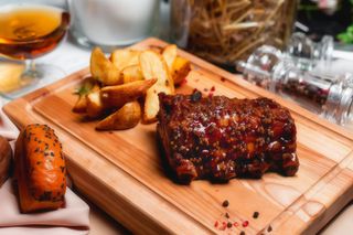 Свинячі ребра в медово-гірчичному соусі (270/100г)