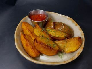 Картопля по - селянськи (200г)