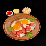Яєчня з ковбасою (200г)