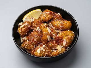 Курча в кисло-солодкому соусі (200г)