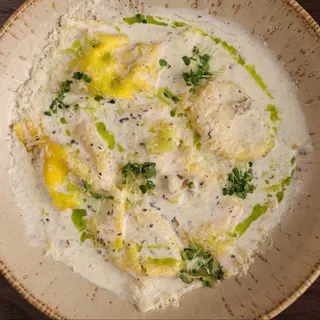 Ravioli ai funghi e bacon