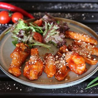 Крильця в апельсиновому соусі