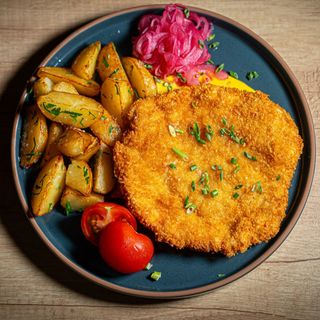 Шніцель зі свинини з картоплею по-селянськи (450 г)