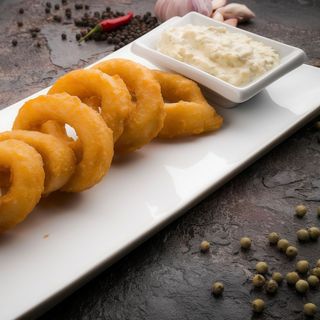 Кільця кальмарів в панірувальних сухарях (150/50г)