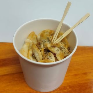 Смажені вареники з картоплею та грибами