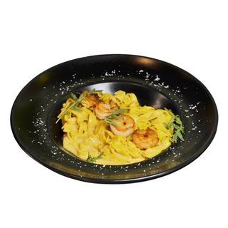 Спагетті з креветками під сирно-устричним соусом