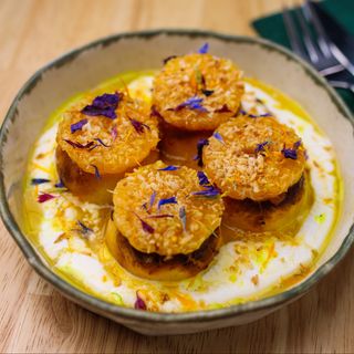 Сирники з мандариновим соусом та крем-йогуртом (310г)