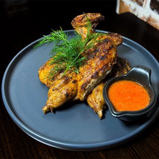 Курча на мангалі (700г)