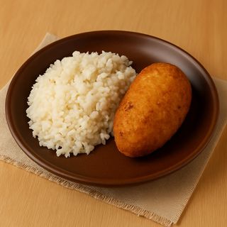 Рис з котлетою по-київськи (310г)