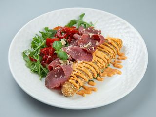 Томлений ростбіф з баклажаним шніцелем (250г)