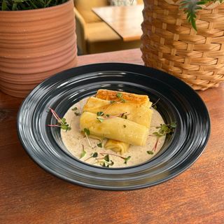 Млинці з куркою під грибним соусом 200/100г