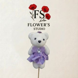 Іграшка ведмедик в лавандовій сукні  на шпажкі.