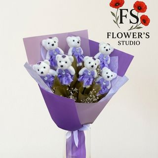 Букет з іграшок, лавандово-фіолетове упакування.