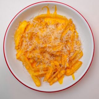 Картопляні діпи з сирним соусом (210г)