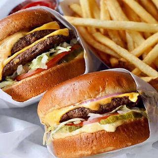 2 grilled beef burgers+ fries + free soda