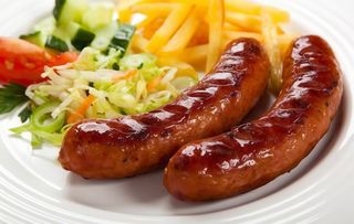 2 Beef Sausages + Chips + Soda 500ml