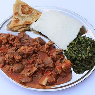 1/2 wet fry goat, chapati,posho & sukumawiki