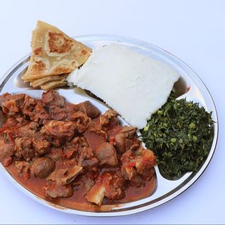 1/2 wet fry goat, posho, chapatti & sukumawiki
