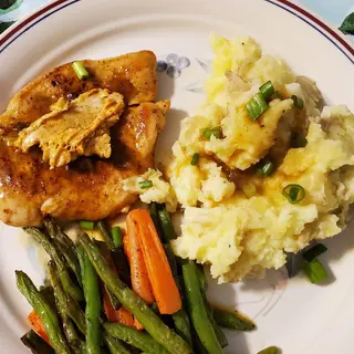 Stir fried chicken and mashed potatoes