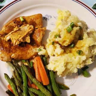 Stir fried chicken and mashed potatoes