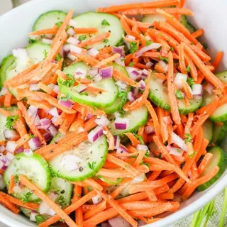 Cucumber, carrot, onion and ovaccado salad