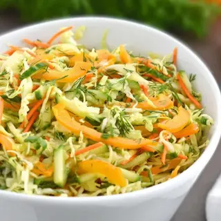 Cabbage ,carrot, bell pepper and onion salad