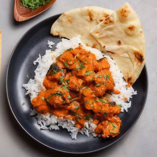 Chicken tikka masala & naan with rice plus soda