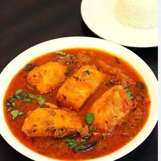 Fish curry served with steamed basmati rice