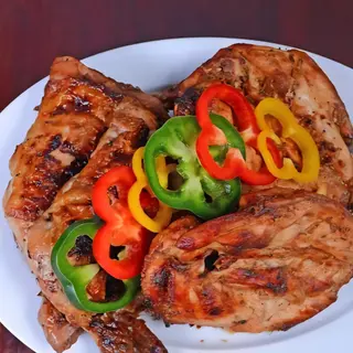 Full oven chicken served with an accompaniment
