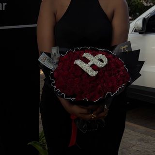 Red bouquet with letter