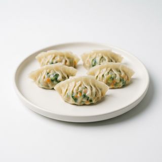 150.Ravioli di verdure al vapore - 5 pezzi素饺5个