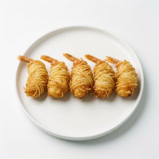 133.Gamberetti fritti in crosta di patate - 5 pezzi 炸面虾卷5只