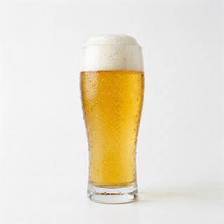 Cerveza Águila Tercio