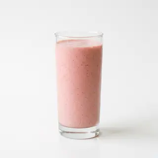 Zumo De Fresa Con Plátano Y Leche (16 Oz.)