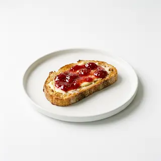 Tosta con mermelada y mantequilla