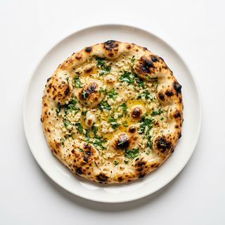 Tandoori-Lachsan-Kulcha Ración