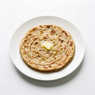 Paratha con mantequilla