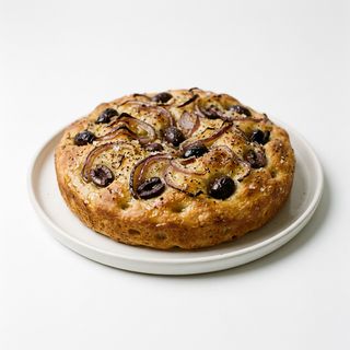 Trancio di Focaccia barese con cipolla e olive