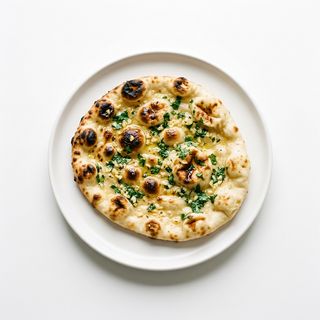Pan Naan Con Ajo (1 Ud.)