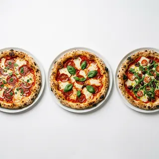 3 pizzas grandes a elegir (32 cm.)