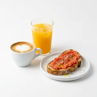 Café + Zumo De Naranja + Tostada Con Tomate Natural