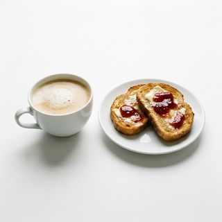 Combo De Café Con Leche 350 Ml. Y Tostada Con Mantequilla Y Mermelada