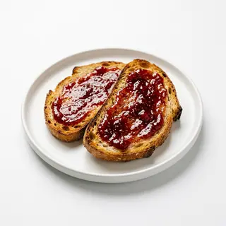 Desayuno De Tostadas Con Mermelada
