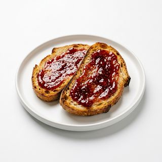 Desayuno De Tostadas Con Mermelada