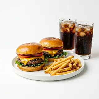 Menú 2 Hamburguesas + 1 Patatas + 2 Latas