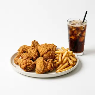 Piezas De Pollo (12 Uds.) Con Patatas Y Coca-Cola (1 Lit.)